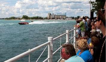 Crowd watching power boats race during the International Power Boat Festival. Photo courtesy of discoveriesthatmatter.ca
