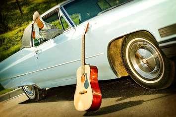 Cars and guitar photo by elljay from pixabay. 