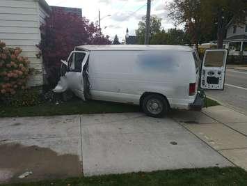 A van struck a house on Michigan Ave in Point Edward - Oct. 2/20 (Photo courtesy of Lambton OPP)