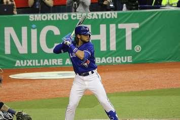 Bo Bichette at bat. 25 March 2019. (Photo by D. Benjamin Miller from Wikipedia)