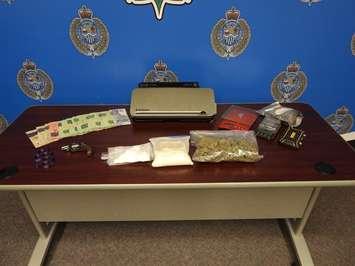Drugs and currency sized by the Sarnia Police Vice Unit.  August 2022.  (Photo provided by SPS)
