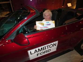 Gladys Noble-Lemon wins a new car at the OLG Point Edward Casino.  Photo submitted by OLG.