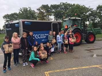 Madame Therien's Grade 7 french immersion class  at Errol Rd. Public School in Sarnia celebrate a successful food drive. October 11, 2017 (Photo by Melanie Irwin) 