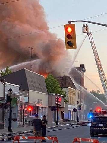 Fire crews tend to a fire on King St. in downtown Forest. June 16, 2021. (Photo courtesy of Sarah Duplisea.)