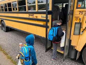 Students head back to school on the bus. September 2020. Blackburn News File Photo.