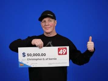 Christopher Graham of Sarnia celebrates a $50,000 lotto prize (Photo courtesy of OLG)