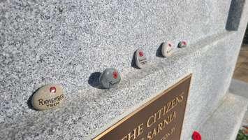 "Remember Them" rocks placed at the Sarnia Cenotaph in Veterans Park.  November 2021.  (Photo by Sarnia Legion Branch 62)