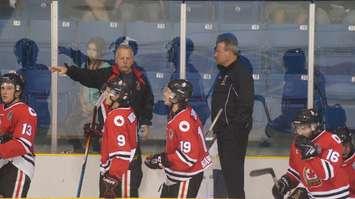 Head Coach Mark Davis gives instructions during the Legionnaires home opener vs St. Thomas. (photo by Jake Jeffrey)
