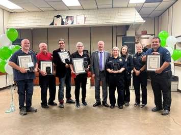 From left to right: Paul Gordon, Roger Mailloux, Ross Ellsworth, Susan Laker, Mayor Brad Loosley and four members of Support Operations Response
Team at the annual Volunteer Appreciation Dinner. September 2022.  (Photo by Town of Petrolia)