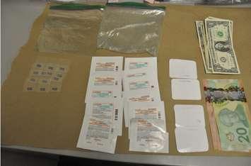Fentanyl patches and cash seized. (File photo courtesy of London police.)