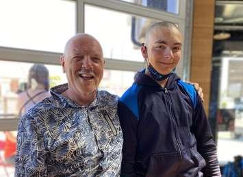 Former Big Brothers Big Sisters of Sarnia-Lambton Ex. Director Mike Hurry with his Little Brother, Eddie, during Mike's hair fundraising event.  15 August 2021.  (Photo by BBBS of SL)
