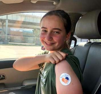 Emma Ritchie after getting her first COVID-19 vaccine dose. (Submitted photo). 