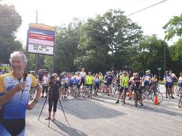 Granfondo Chairman Ken MacAlpine speaking to a crowd of cyclists at Blackwell Plaza. August 1, 2018. (Photo by Colin Gowdy, BlackburnNews)