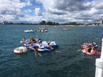 Participants in the Pt. Huron Float Down are blown into Sarnia Bay. August 21, 2016 BlackburnNews.com photo by Melanie Irwin.