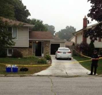 Crime scene tape around a home on Twin Lakes Dr. Sept. 7, 2012 (Blackburnnews.com Photo)