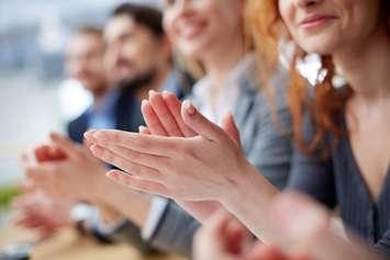 People clapping. © Can Stock Photo / pressmaster