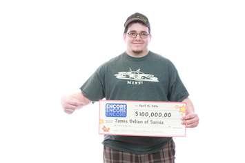 James Belton claims his ENCORE winnings. Photo submitted by OLG. 