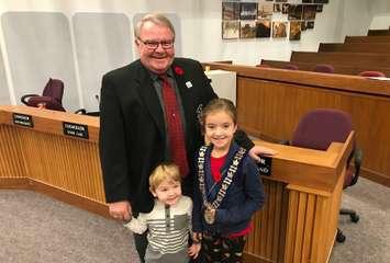 Lambton County Warden Bill Weber shows his grandchildren, 3 year old Archie and 8 year old Sella Hern, around Lambton County Council chambers in Wyoming. November 7, 2018 Photo by Melanie Irwin