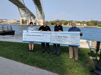 Bluewater International Granfondo makes a $50,000 donation to St. Joseph's Hospice and Bluewater Health's Palliative Care. (L-R Kathy Alexander from Bluewater Health, Jon Palumbo and Ken MacAlpine from BIGF, and Larry Lafranier from St Joseph's Hosptice.) Photo by Jake Jeffrey.