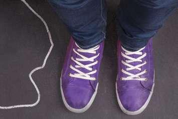 Purple shoes being worn on Dress Purple Day. (Photo via Ontario Association of Children's Aid Societies)