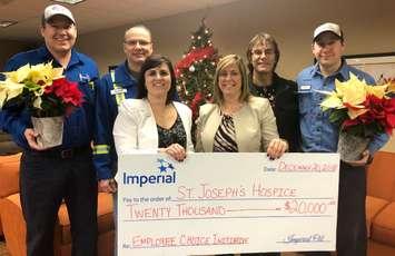 Members of Sarnia's Imperial Oil presenting St. Joseph's Hospice with a cheque for $20,000. December 20, 2018. (Photo by Imperial Oil)