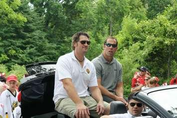 New Sting owners Derian Hatcher and David Legwand in Canada Day parade July 1, 2015 (BlackburnNews.com photo by Dave Dentinger)