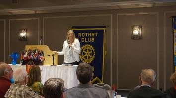 Bank of Canada Senior Analyst Vanessa Collins speaks to Rotary Club of Sarnia about counterfeit money June 8, 2015 (BlackburnNews.com Photo by Briana Carnegie)