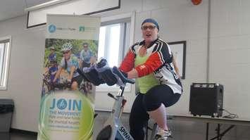 Cyclist Carol MacPherson holds a ceremonial spin class to kick off the CMHA LK Ride Don't Hide Campaign leading up to the June 26th event. April 5, 2016 (BlackburnNews.com Photo by Briana Carnegie)