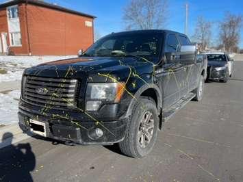 A truck vandalized with yellow paint in Corunna - Mar 14/23 (Photo courtesy of OPP West Region via Twitter)