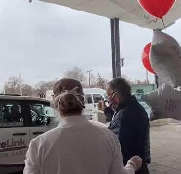 Bluewater Health celebrating the departure of a COVID-19 patient, 81-year-old Alex, from the Sarnia hospital. April 2020. (Screenshot from video by BWH)