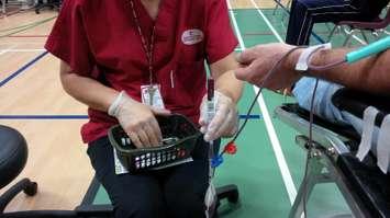 A donor gives blood at a clinic. Blackburn News file photo.