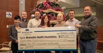 Employees from Shell Sarnia presenting Bluewater Health with a cheque for $83,000. December 21, 2018. (Photo by BWH)