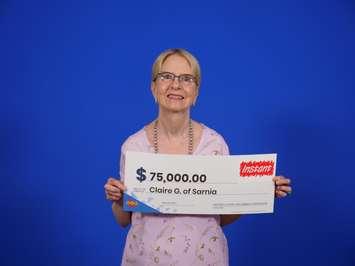 Sarnia's Claire Garner celebrates a $75,000 top prize win playing Ca$hingo (Photo courtesy of OLG)