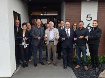The ribbon is cut at the Bluewater Health Foundation Dream Home at 564 Franco Ave. in Sarnia - Oct. 3/19 (Blackburnnews.com Photo by Josh Boyce)