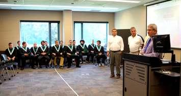 16 male students graduate from the first class of General Machinists at Lambton College. 3 students absent. July 21, 2015 (BlackburnNews.com Photo by Briana Carnegie)