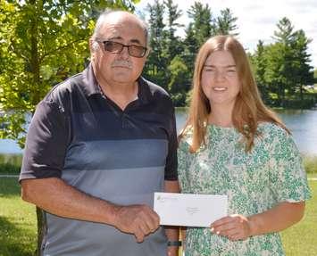 Chair of Ausable Bayfield Conservation Foundation Dave Frayne presented a $1,000 Student Environmental Award to Kirsten McIntosh. August 9 2022. (Photo courtesy of Tim Cumming)