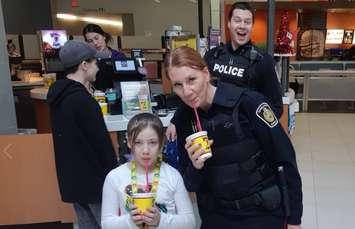 Enjoying Booster Juice during CopShop at the Lambton Mall. December 5, 2018. (Photo by the Sarnia Police Service)