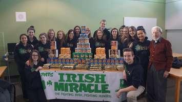 St. Patrick's high school students prepare for the 2014 Itish Miracle food drive. December 2, 2014 (BlackburnNews.com photo by Jake Jeffrey)