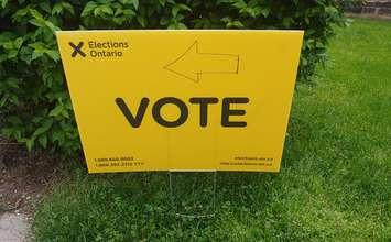 An Elections Ontario sign outside of a polling station. (File photo by Craig Needles, Blackburn Media)