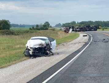 A passenger vehicle and transport collide on Highway 40 - Aug 4/22 (Photo courtesy of OPP via Twitter)