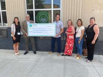 INEOS Styrolution Canada Ltd. gives $16,400 to ACCESS Open Minds, Youth Wellness Hub Ontario. Pictured left to right are: Taylor Spinnato, CMHA Lambton Kent, Mental Health Promotion Specialist, Brian Lucas, INEOS Styrolution Canada Ltd., Sarnia Site Director, Tim Heath, Manager of Integrated Client Services, CMHA Lambton Kent, Tammy Bell, Early Intervention Worker, CMHA Lambton Kent, Maureen Valdes, Early Intervention Worker - RPN, CMHA Lambton Kent, Andria Appeldoorn, Director of Fund Development and Communications, CMHA Lambton Kent. Submitted photo.