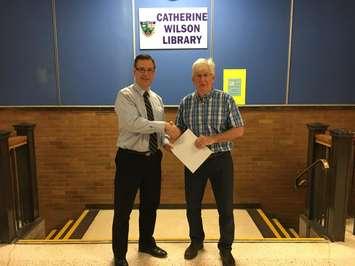 Foundation Board member, Scott McKelvie, makes a cheque presentation to GLSS principal, Paul Wiersma.  (Photo submitted by Great Lakes Secondary School)