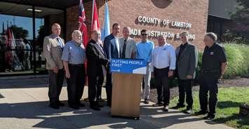 Sarnia-Lambton MPP Bob Bailey, Lambton-Kent-Middlesex MPP Monte McNaughton, and SWIFT Chair David Mayberry joined by other dignitaries at SWIFT announcement - Aug 9/19 (Blackburnnews.com photo by Josh Boyce)