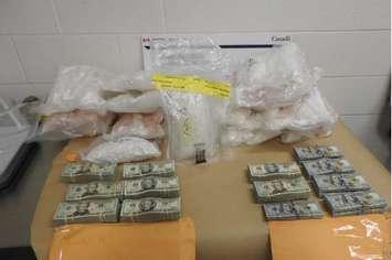 Methamphetamine and U.S. cash seized at the Blue Water Bridge May 2, 2019 (photo courtesy of CBSA)
