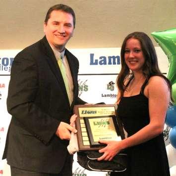 Madisyn Campbell with Vice President of Student Success & Campus Services Rob Kardas (Courtesy of Lambton College Athletics)