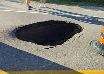 Sinkhole on Lakeshore Road. Photo courtesy of Chippewas of Kettle and Stony Point Facebook Page.