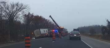 A tractor trailer being pulled out of the ditch on Highway 402 east of Oil Heritage Road. November 19, 2019. (Photo sumbitted to BlackburnNews.com)