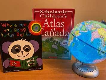 Children's books and globe. Blackburn News Sarnia photo by Melanie Irwin