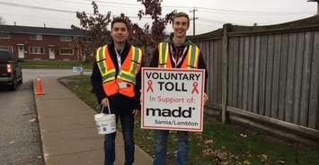 Volunteers collect donations for MADD Sarnia-Lambton voluntary tolls. (Photo submitted and used with permission by MADD)