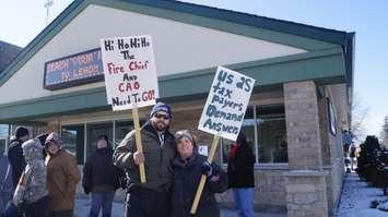 Conner Weed and Kim Searson protest outside the town's municipal office. 14 February 2020. (BlackburnNews.com photo by Colin Gowdy)